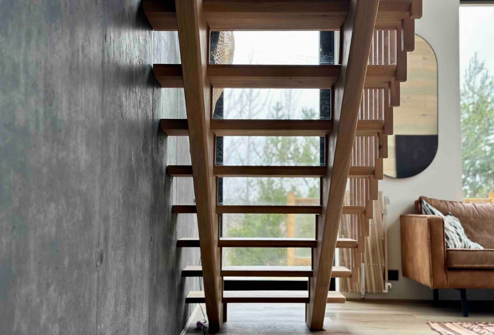 Looking up the open riser stair to the landing above
